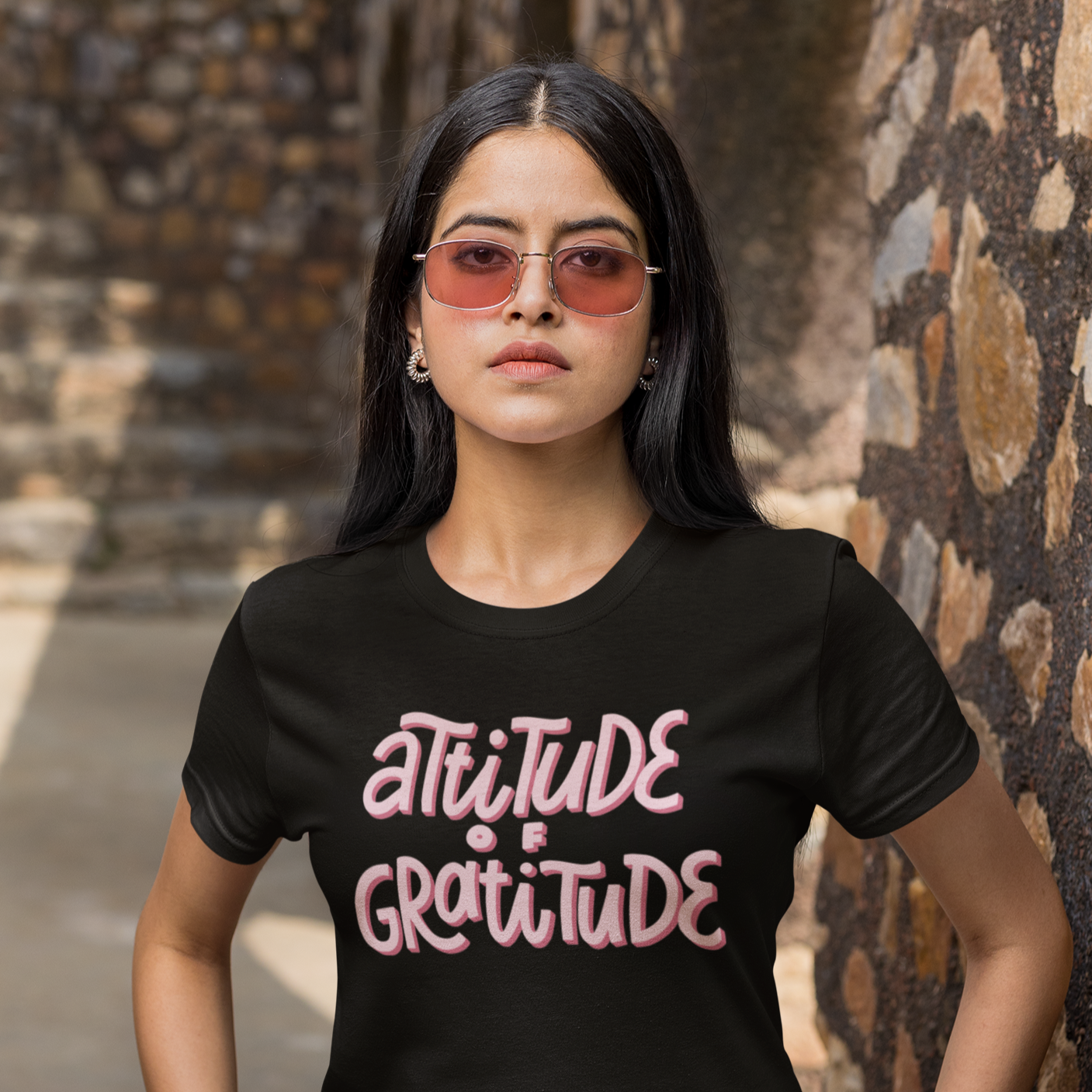 Graphic Unisex T Shirt that reads Attitude Of Gratitude and Canvas tee in the color black