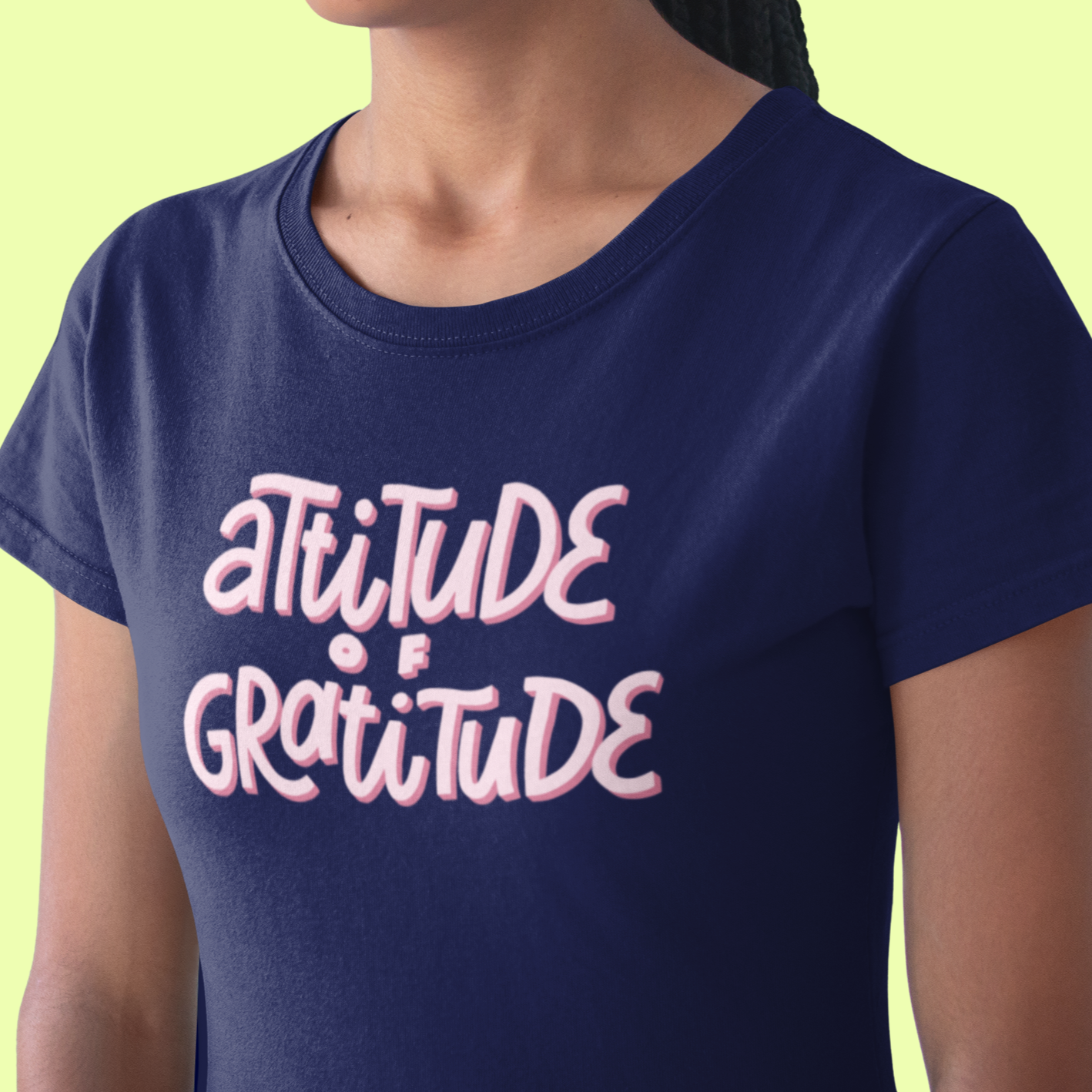 Graphic Unisex T Shirt that reads Attitude Of Gratitude and Canvas tee in the color navy blue