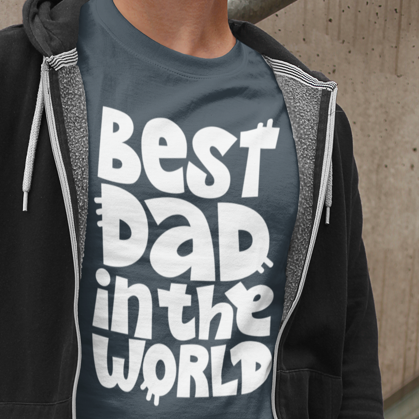 Graphic Unisex T Shirt that reads Best Dad In The World and Canvas tee in the color Charcoal Grey