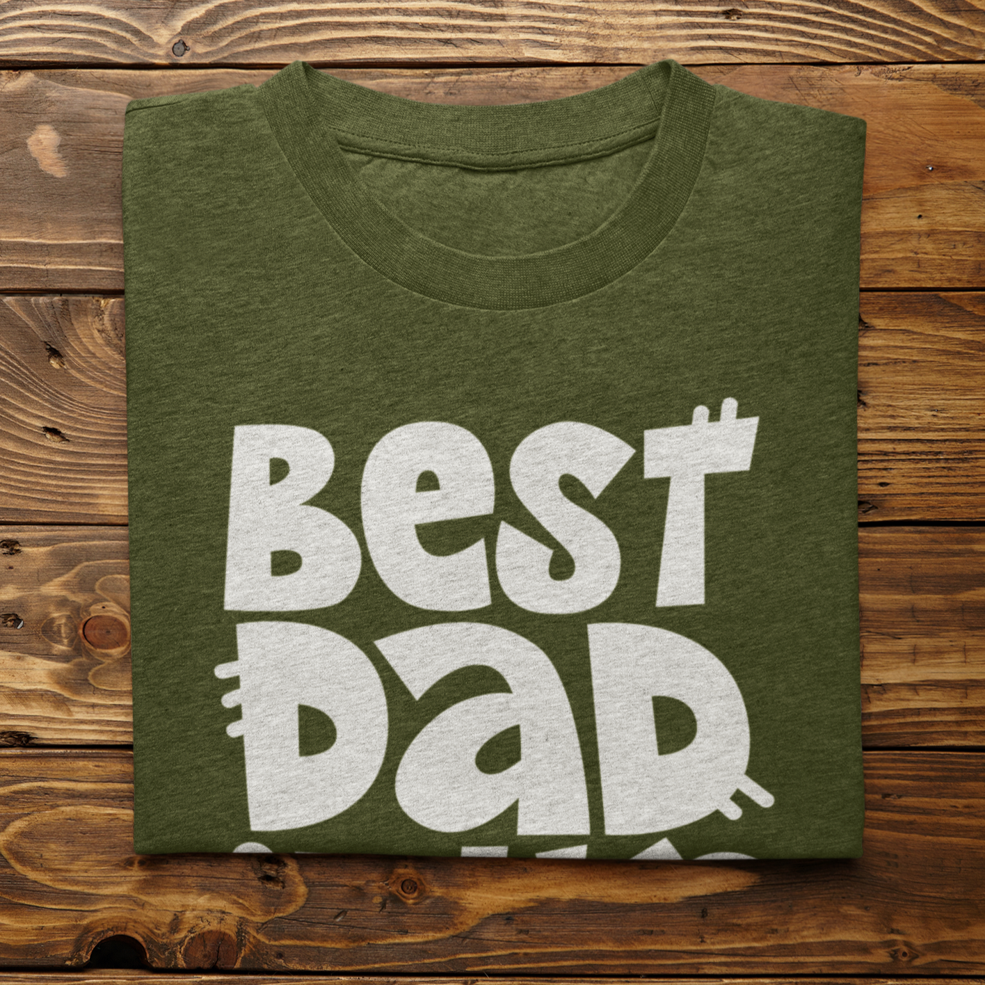 Graphic Unisex T Shirt that reads Best Dad In The World and Canvas tee in the color Military Green