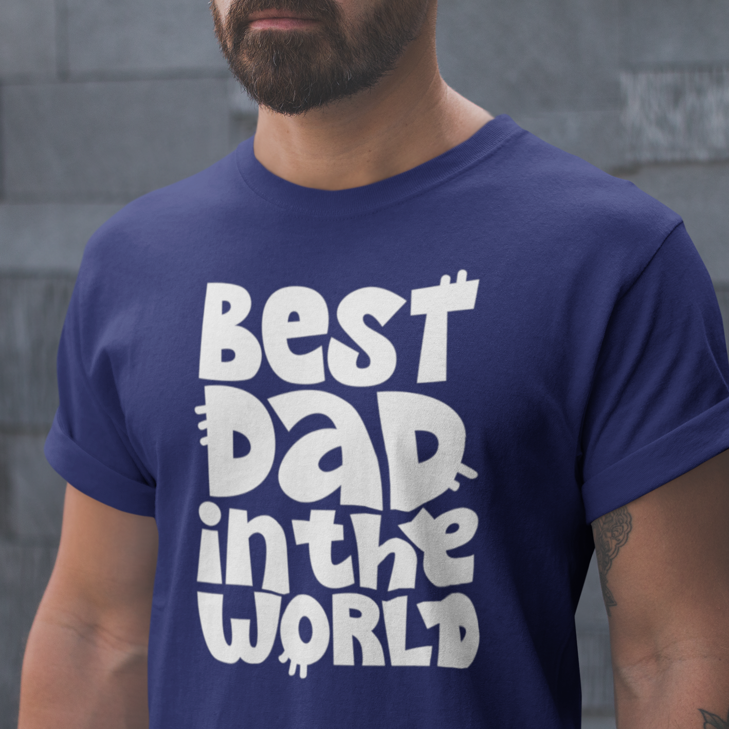 Graphic Unisex T Shirt that reads Best Dad In The World and Canvas tee in the color Navy Blue