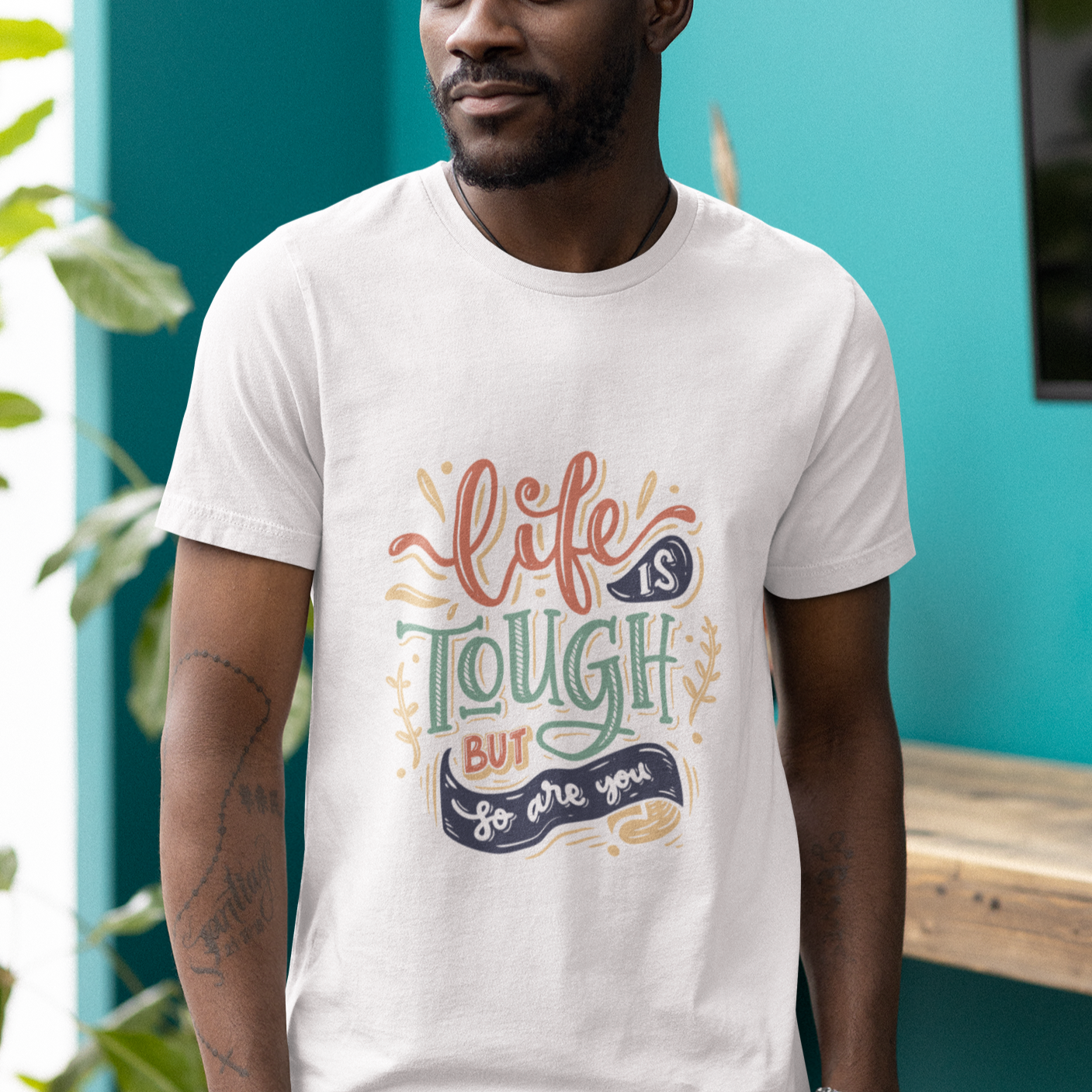 Graphic Unisex T Shirt that reads Life is Tough But So Are You and Canvas tee in the color white