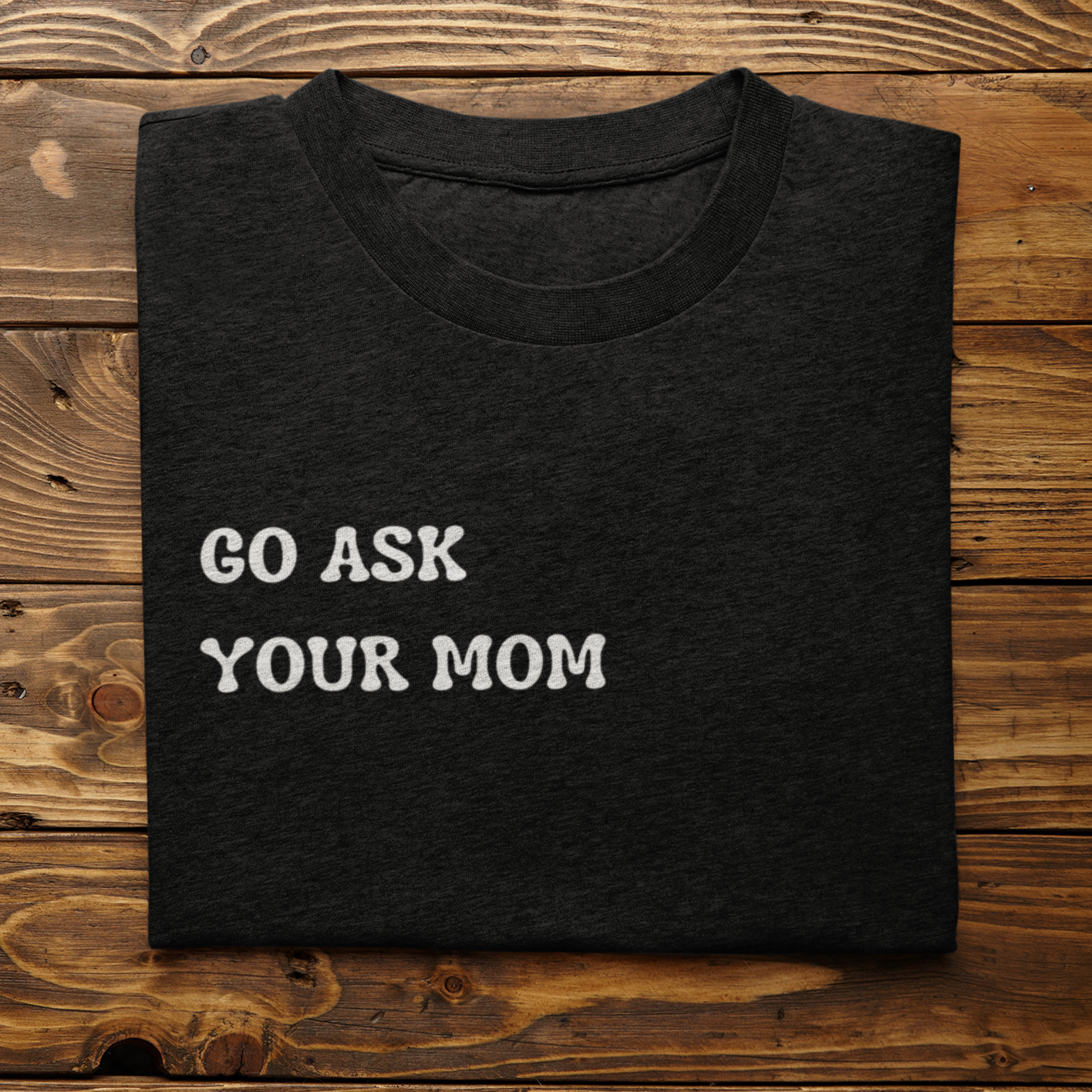 Graphic Unisex T Shirt that reads Go Ask Your Mom and Canvas tee in the color Black