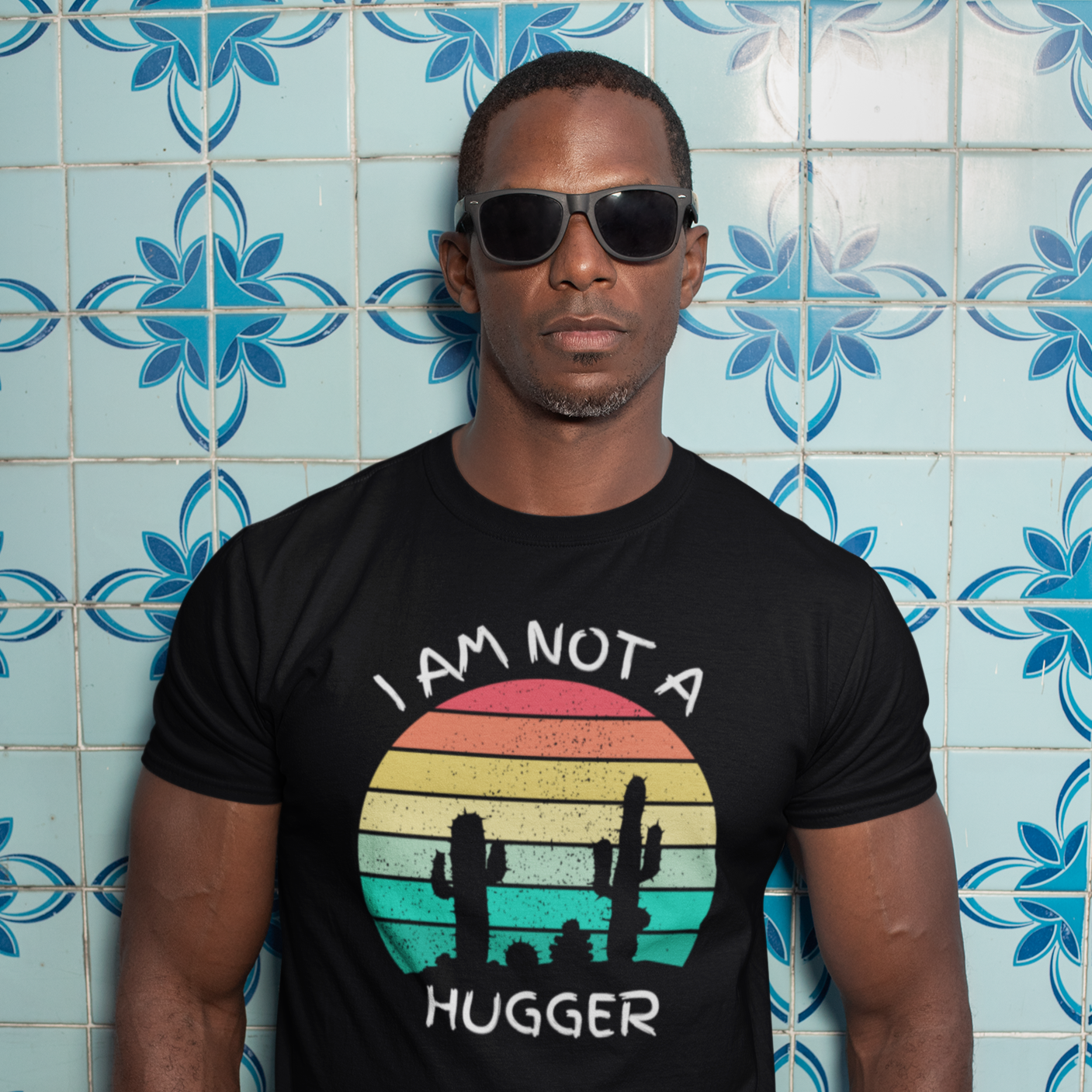 Graphic Unisex T Shirt that reads I Am Not A Hugger and Canvas tee in the color black