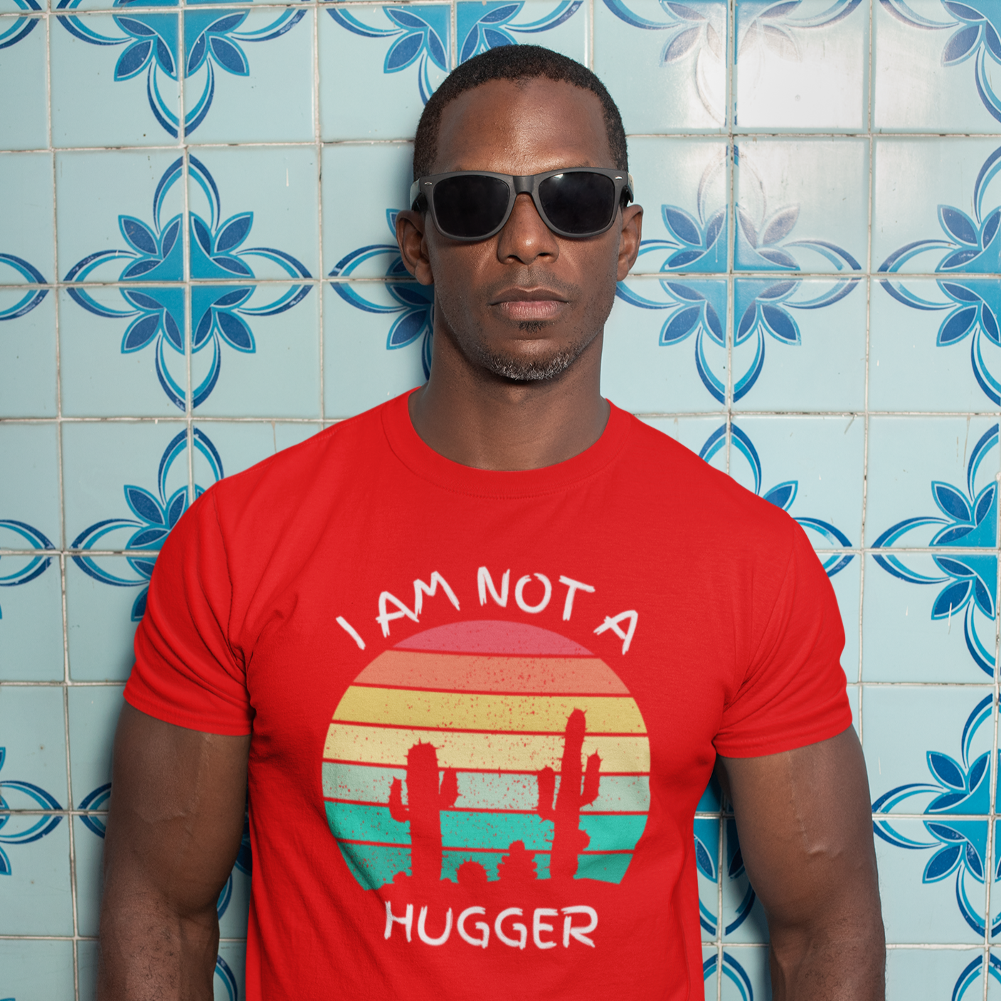 Graphic Unisex T Shirt that reads I Am Not A Hugger and Canvas tee in the color red