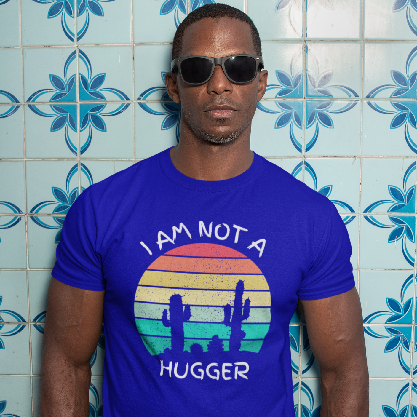 Graphic Unisex T Shirt that reads I Am Not A Hugger and Canvas tee in the color Royal Blue