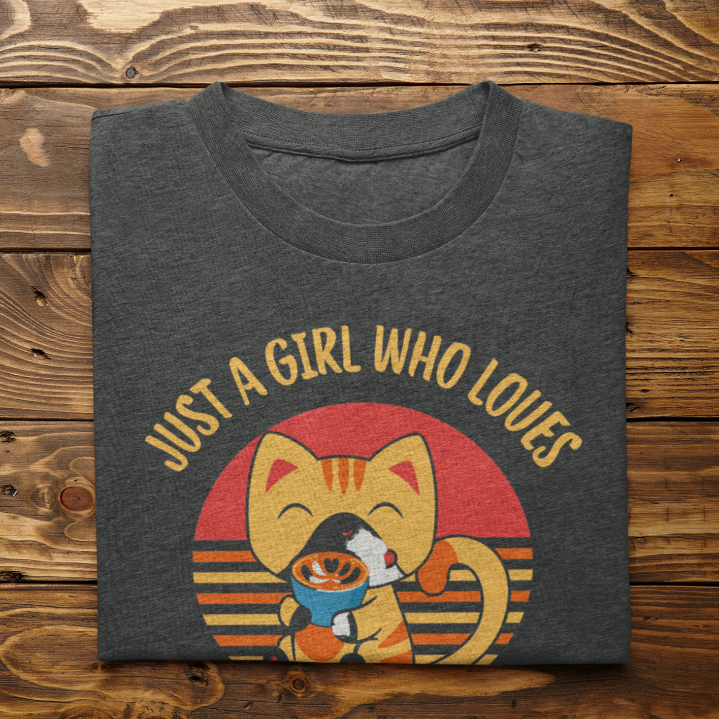 Graphic Unisex T Shirt that reads Just A Girl Who Loves Cats and Coffee and Canvas tee in the color Charcoal grey