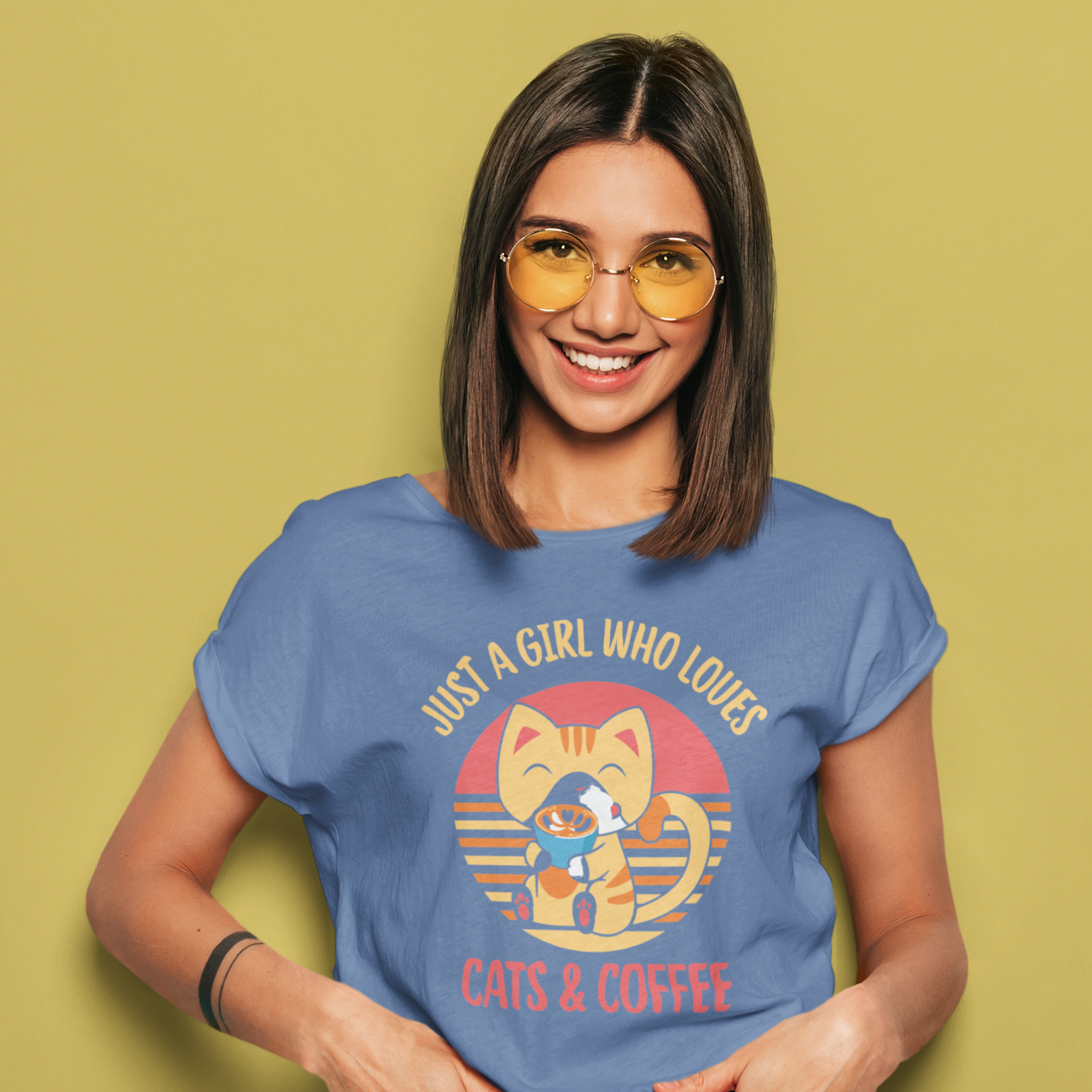 Graphic Unisex T Shirt that reads Just A Girl Who Loves Cats and Coffee and Canvas tee in the color Heather Indigo