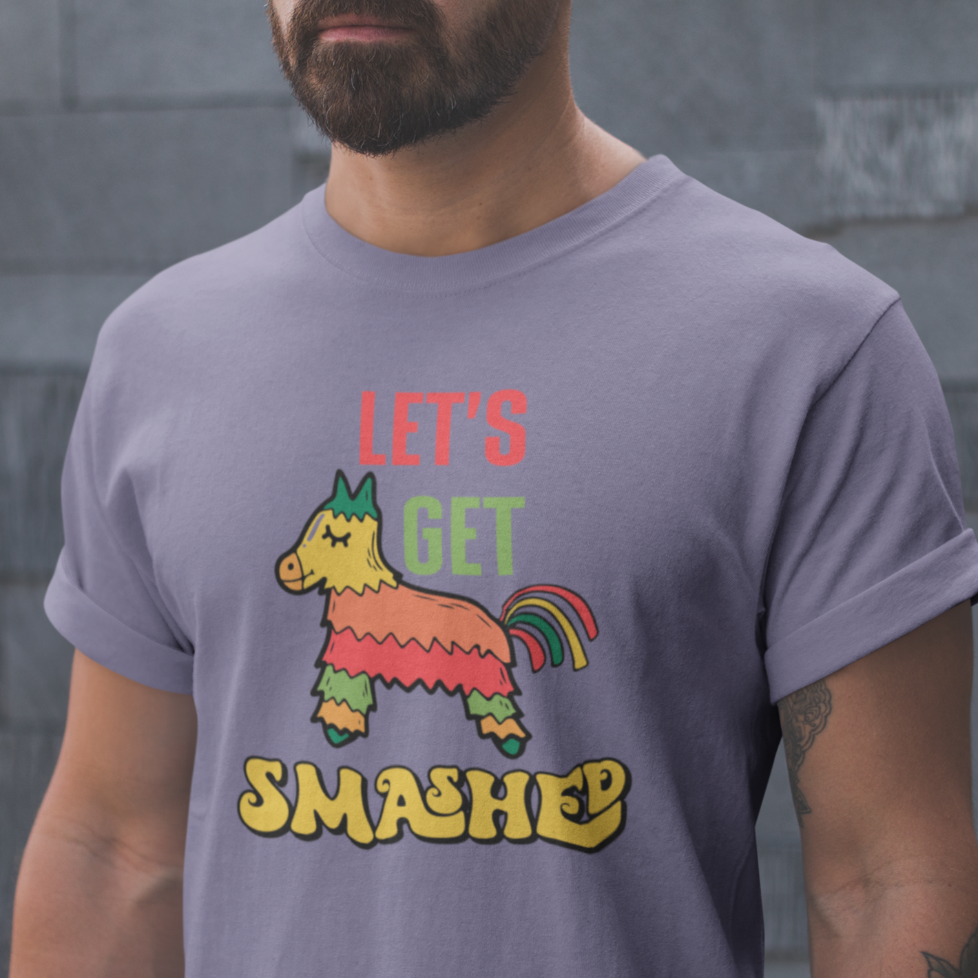 Get into the festive spirit with our catchy 'Let's Get Smashed' Cinco de Mayo shirt featuring a pinata! Embrace the celebration with this playful design, perfect for adding a splash of humor to your fiesta. Stand out from the crowd and make a statement with this fun and lively shirt. Because when it's time to party, smashing is just the beginning!