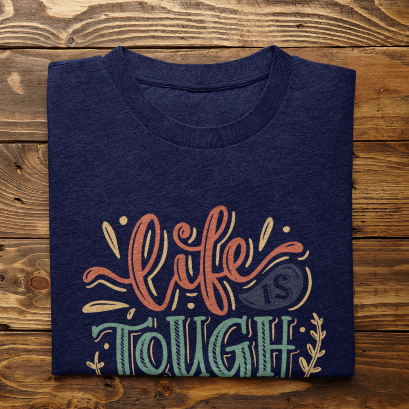 Graphic Unisex T Shirt that reads Life is Tough But So Are You and Canvas tee in the color Navy Blue