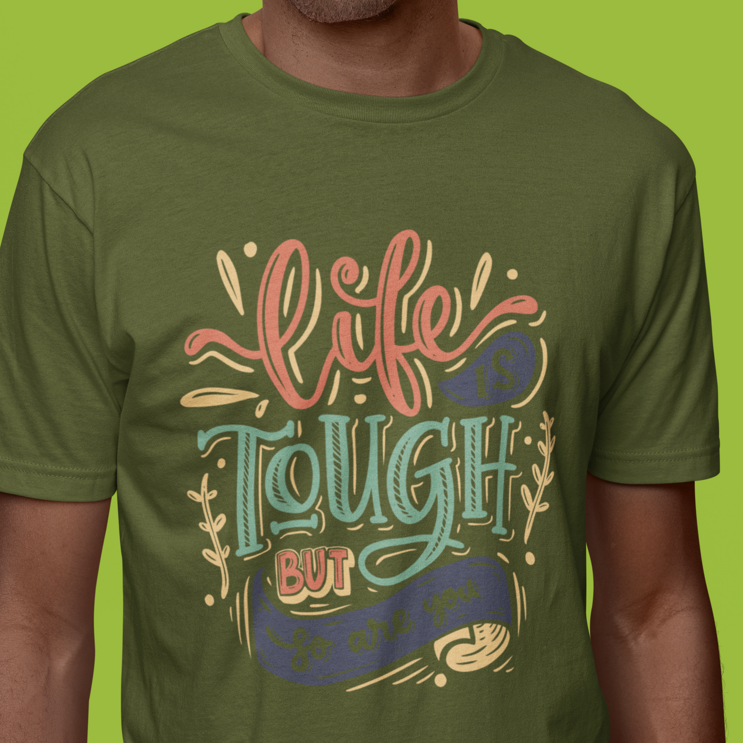 Graphic Unisex T Shirt that reads Life is Tough But So Are You and Canvas tee in the color Military Green