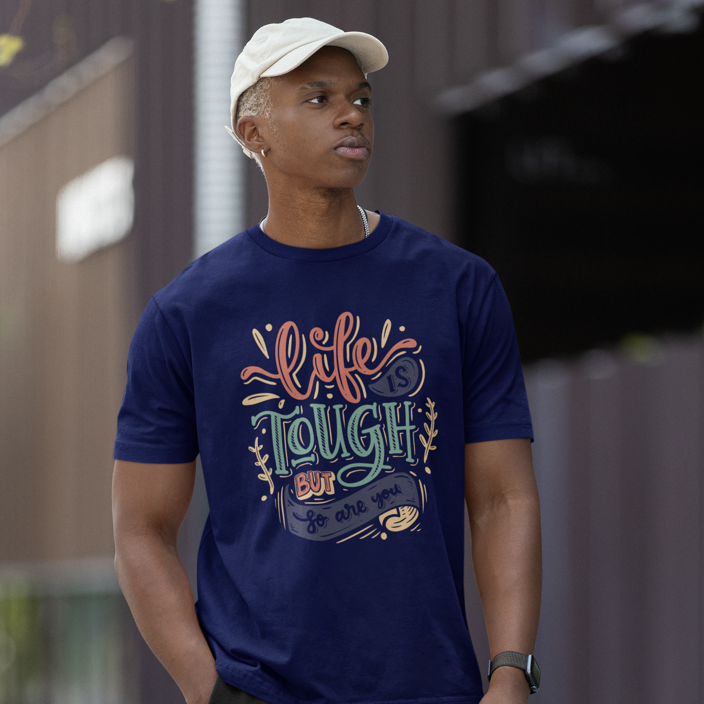 Graphic Unisex T Shirt that reads Life is Tough But So Are You and Canvas tee in the color Navy Blue