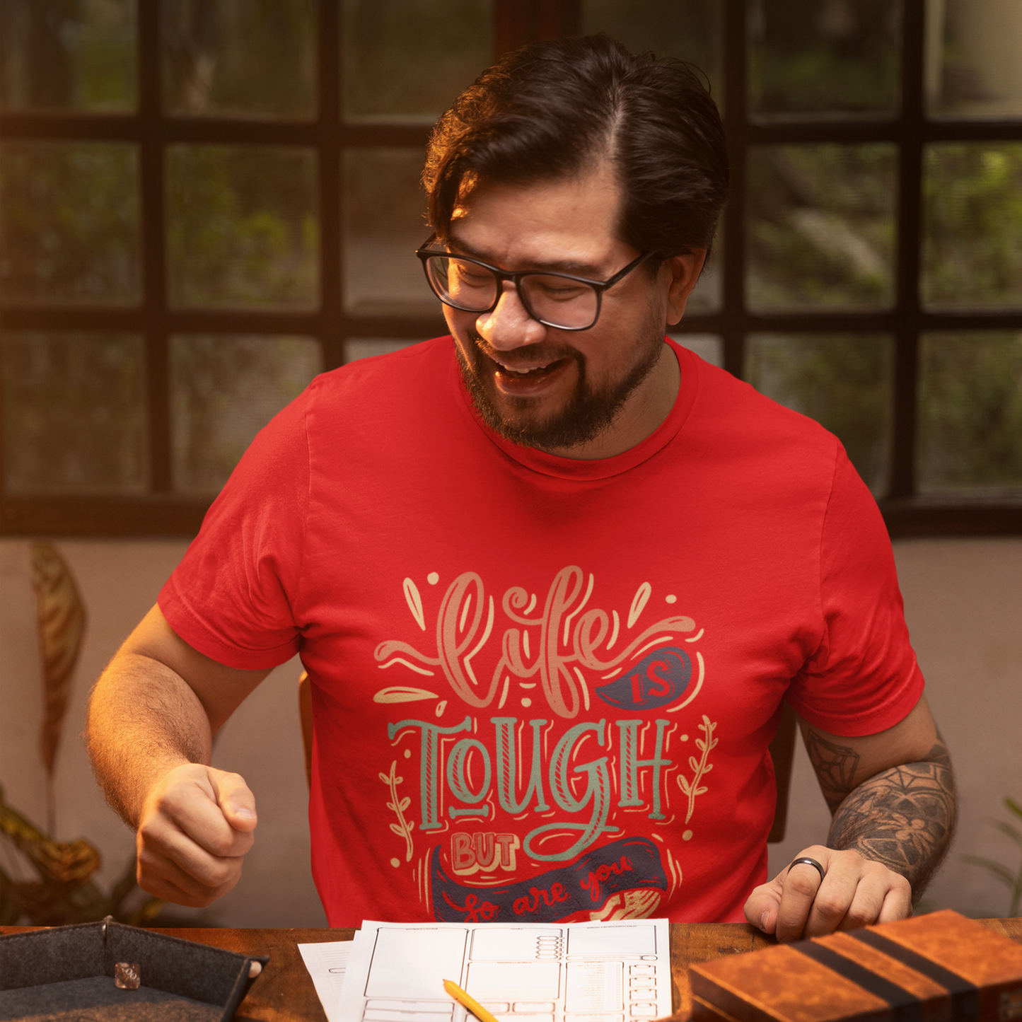 Graphic Unisex T Shirt that reads Life is Tough But So Are You and Canvas tee in the color Red