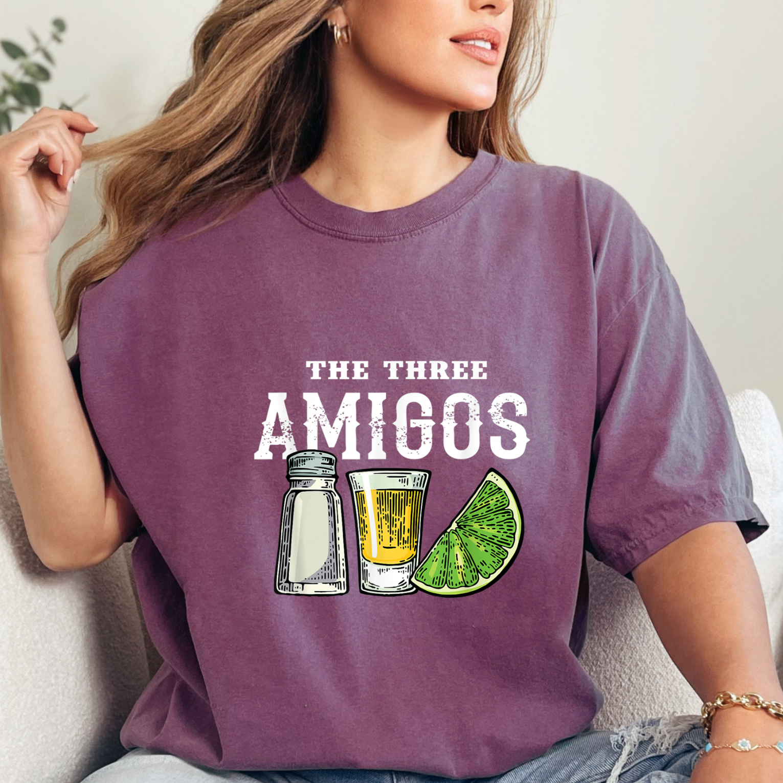 Introducing The Three Amigos t-shirt, perfect for all your fiesta needs! This fun and vibrant shirt features iconic illustrations of Salt, Tequila, and Lime, making it a must-have for any tequila lover or party enthusiast. Whether you're hitting up happy hour, celebrating Taco Tuesday, or simply spreading good vibes, this tee is sure to bring a touch of humor and cheer to your wardrobe. Add a splash of personality to your style with The Three Amigos t-shirt today!