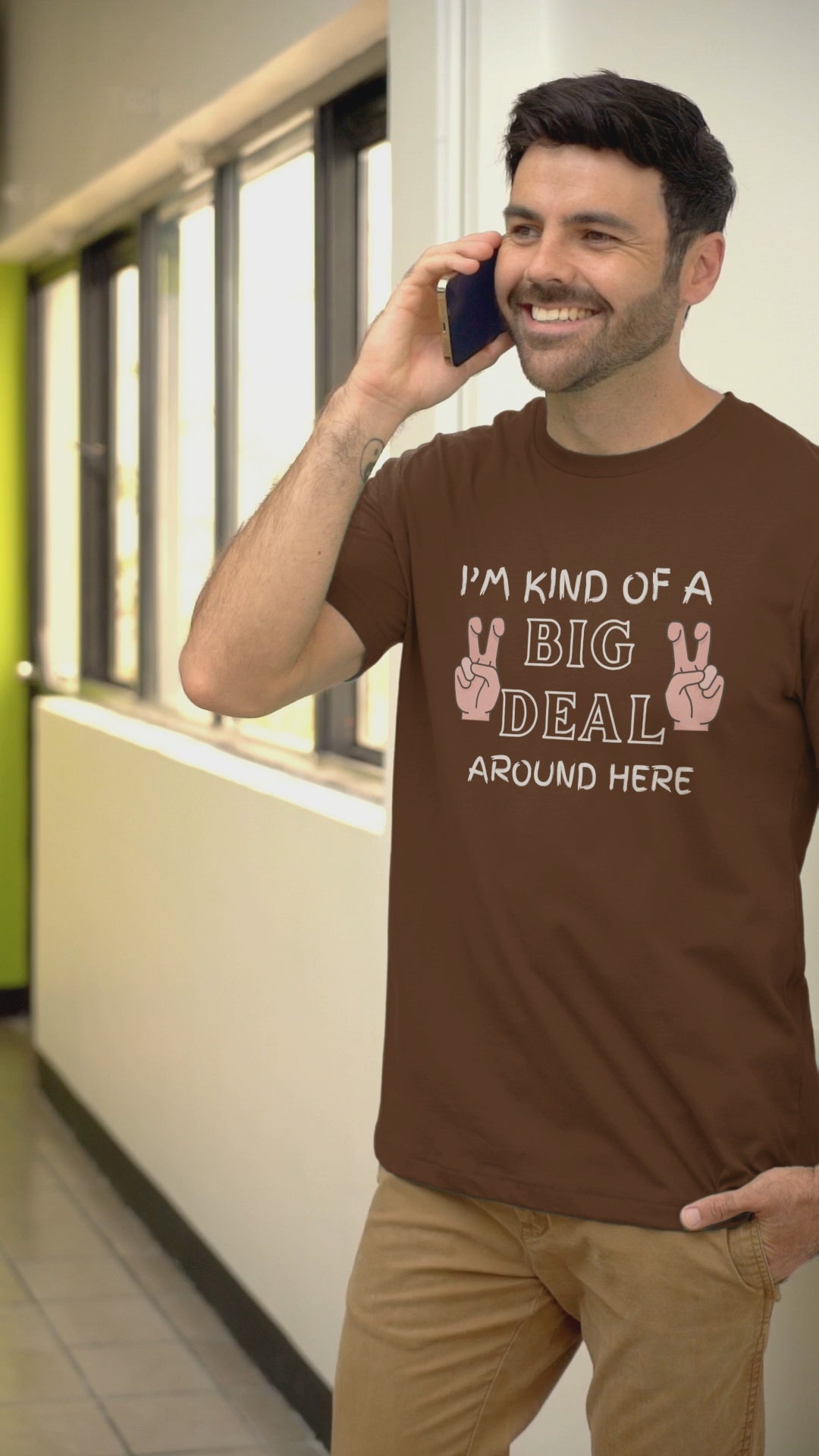 Graphic Unisex T Shirt that reads I&#39;m Kind Of A Big Deal Around Here and Canvas tee in the color Chocolate Brown