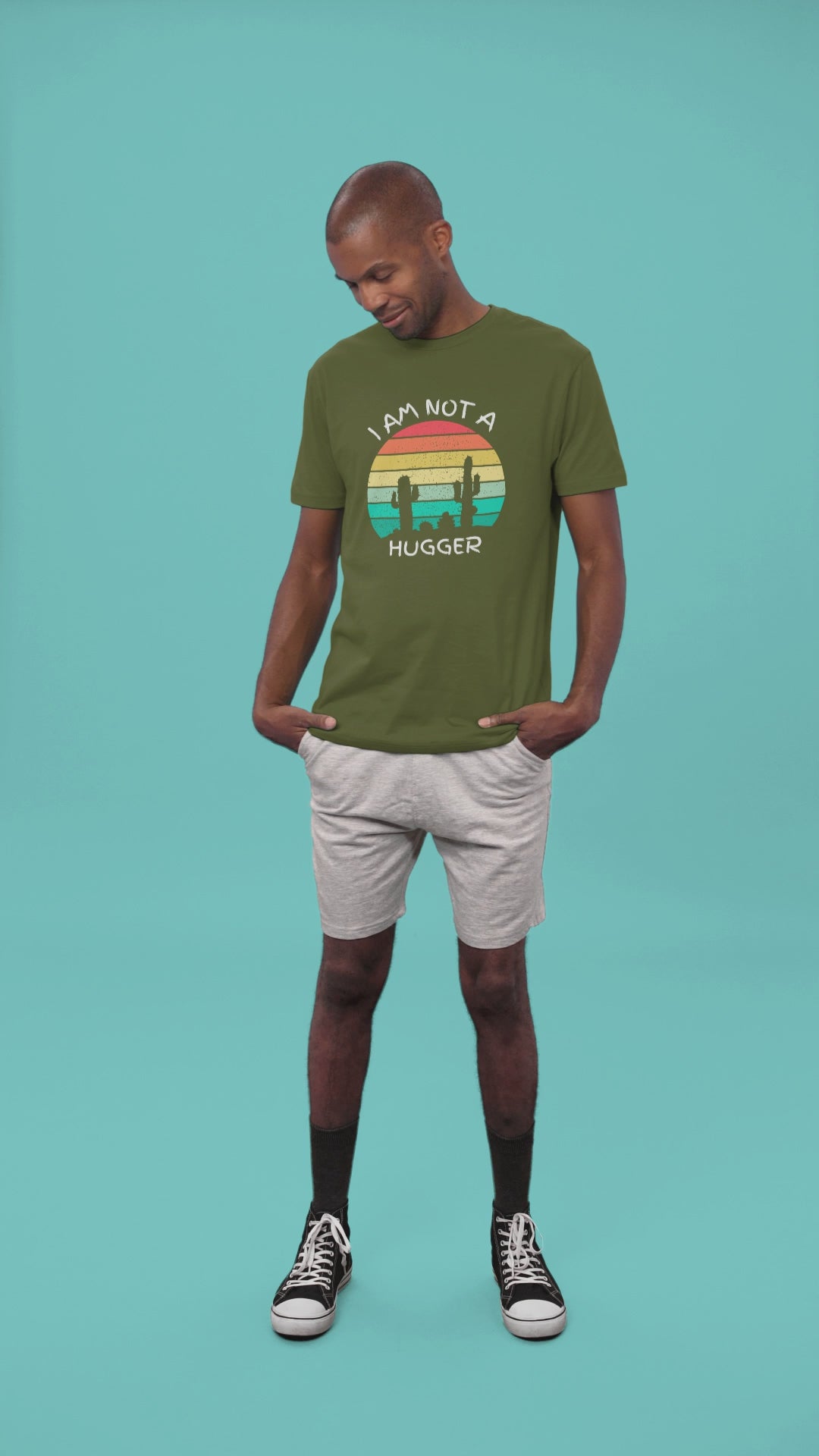 Graphic Unisex T Shirt that reads I Am Not A Hugger and Canvas tee in the color Military Green