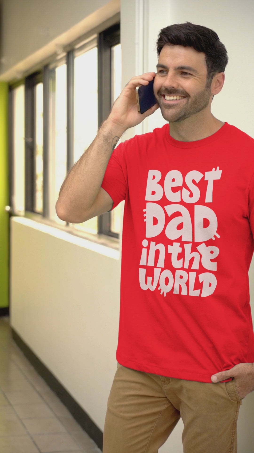 Graphic Unisex T Shirt that reads Best Dad In The World and Canvas tee in the color Red